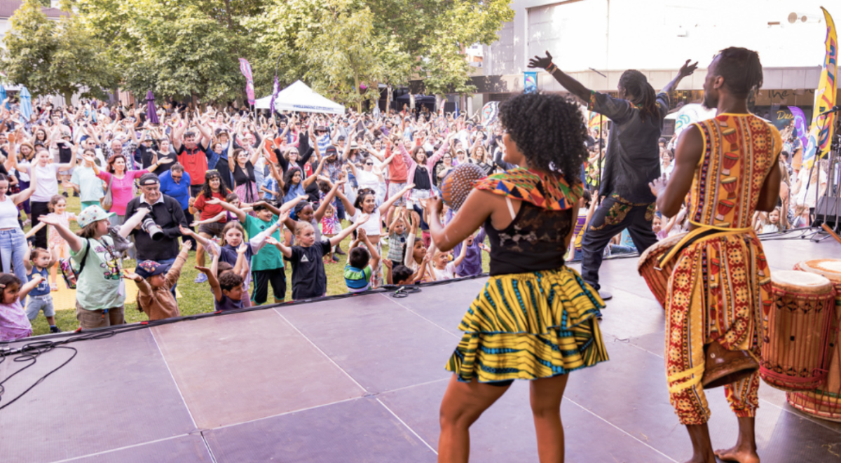 People perform on stage at Wollongong's Culture Mix
